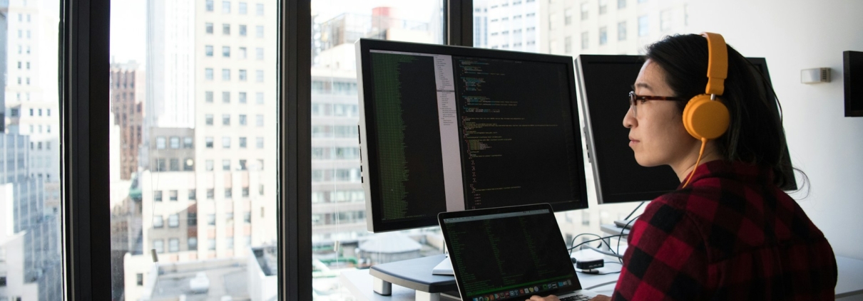 Senior ERP architect reviewing manufacturing system configuration