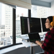 Senior ERP architect reviewing manufacturing system configuration