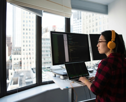 Senior ERP architect reviewing manufacturing system configuration